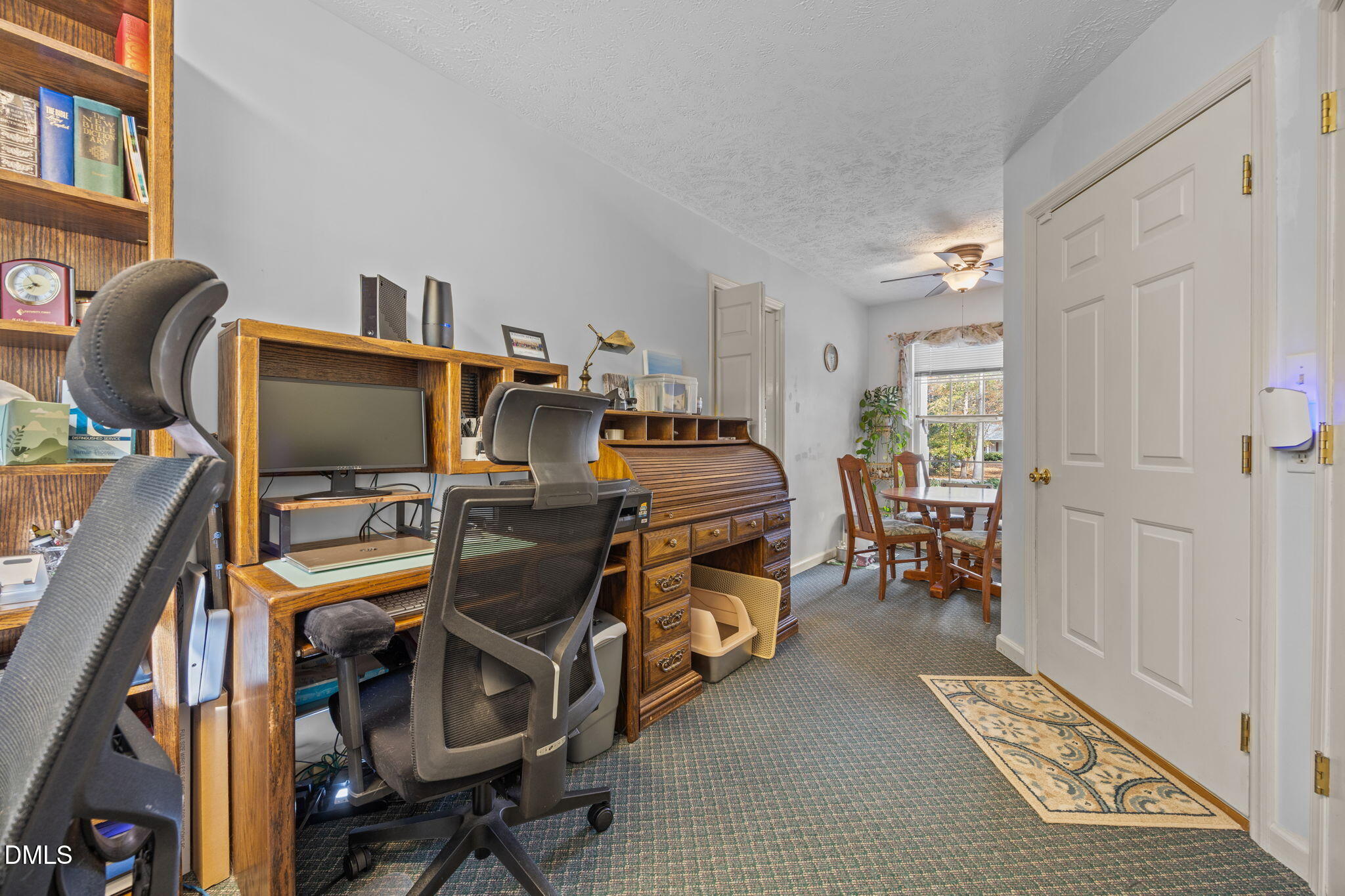 69 Deer Run Court Angier, NC 27501 - Photo 27 of 40 a bedroom with furniture and a window