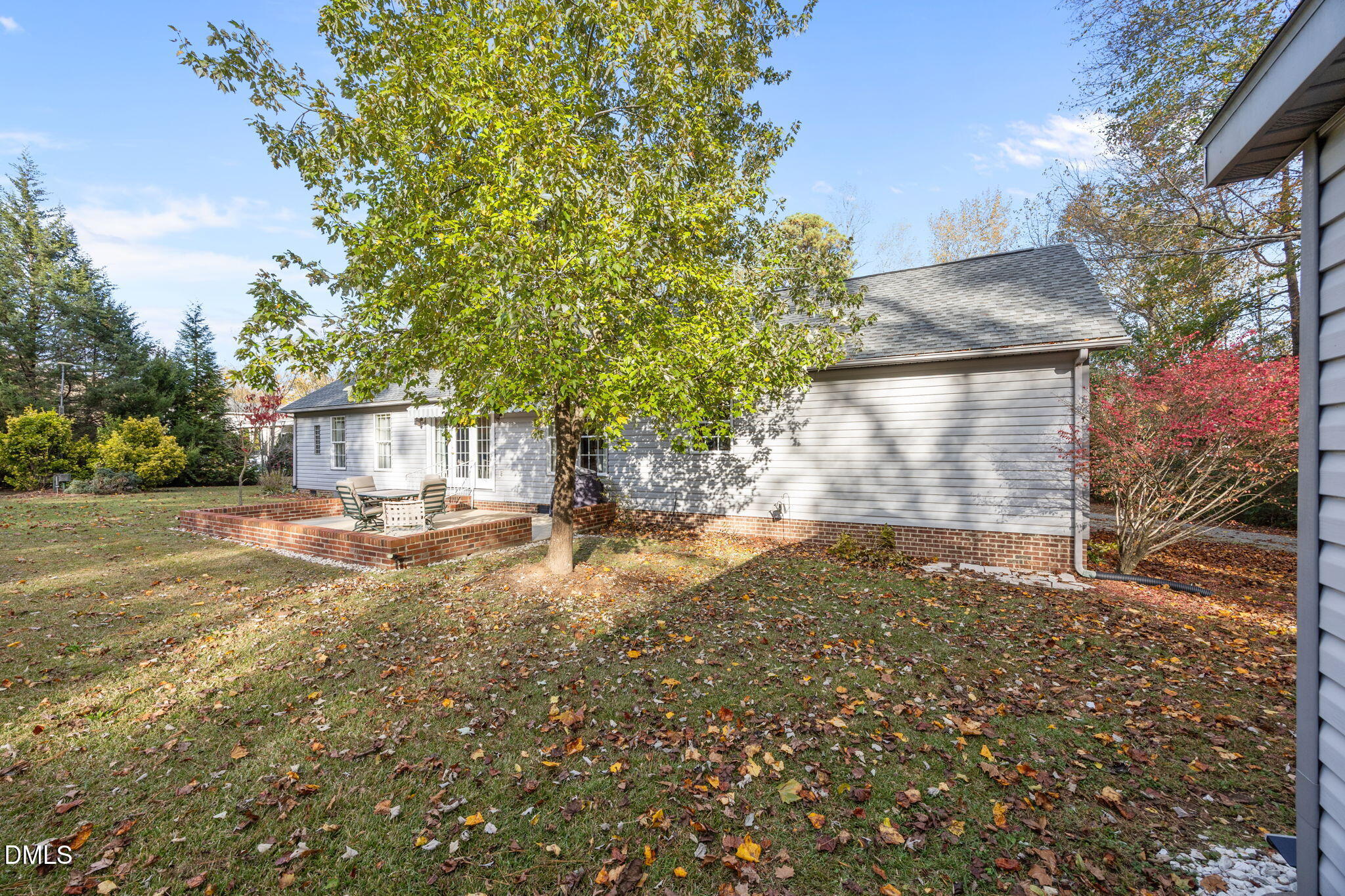 69 Deer Run Court Angier, NC 27501 - Photo 38 of 40 a view of a yard with a tree