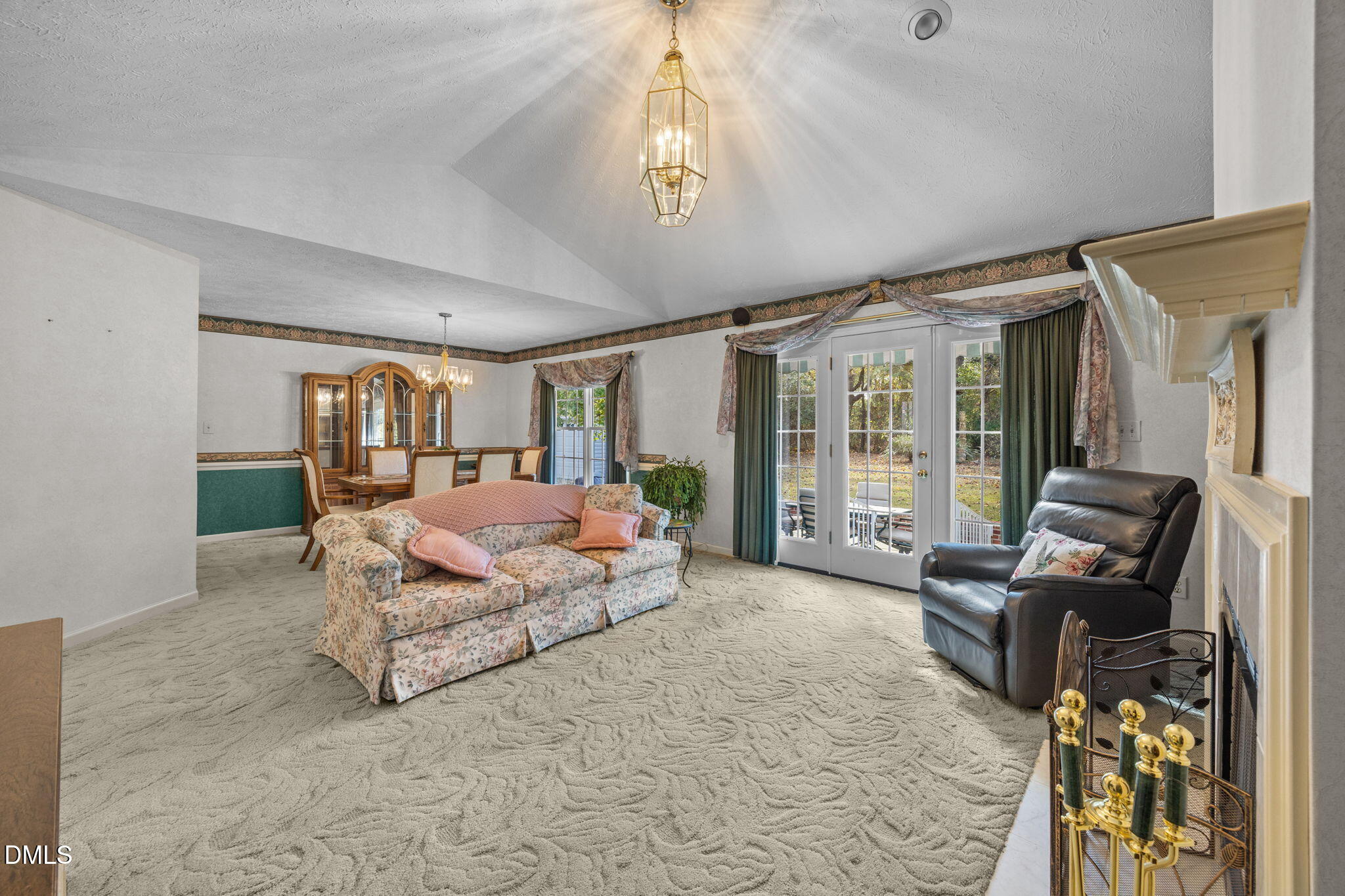 69 Deer Run Court Angier, NC 27501 - Photo 7 of 40 a spacious bedroom with a bed and large mirror
