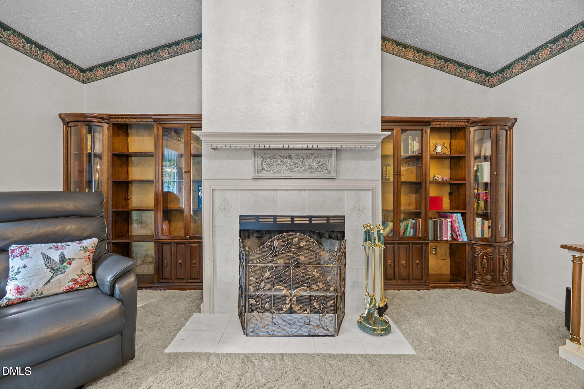 69 Deer Run Court Angier, NC 27501 - Photo 8 of 40 a living room with furniture and a fireplace