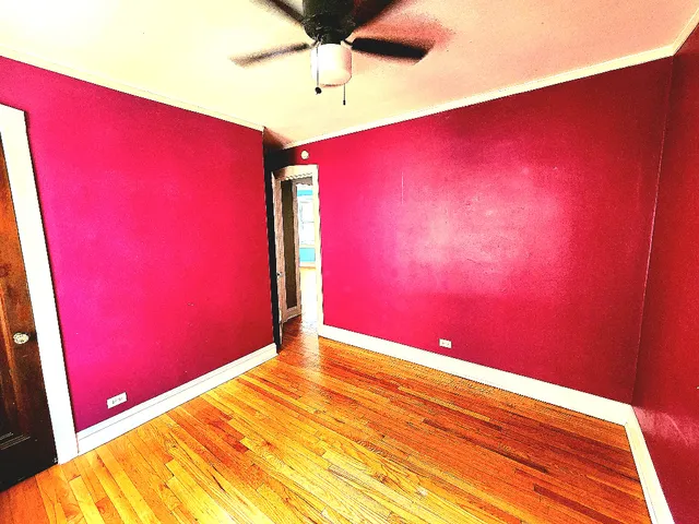 a view of a big room with wooden floor