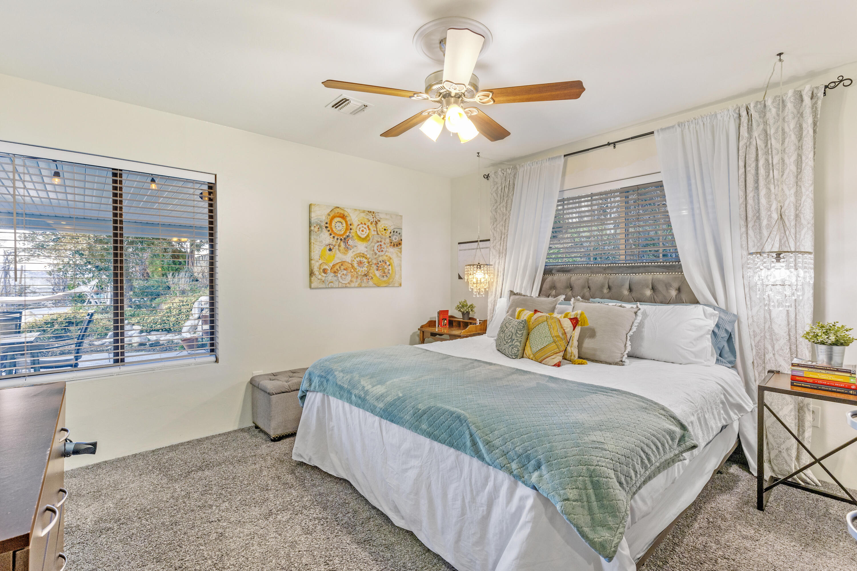 20727 Ridgecrest Drive Tehachapi, CA 93561 - Photo 25 of 27 a bedroom with a bed and window