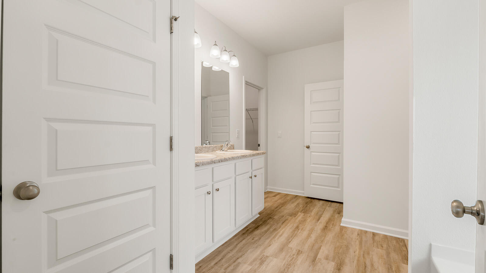 38 Elderberry Street Freeport, FL 32439 - Photo 14 of 34 a bathroom with a sink and a mirror