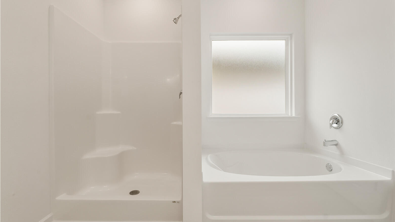 38 Elderberry Street Freeport, FL 32439 - Photo 15 of 34 a white bath tub sitting next to a white sink