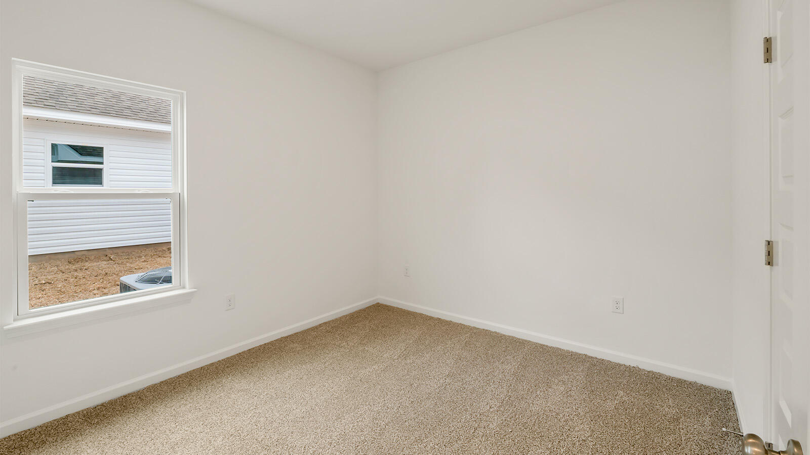 38 Elderberry Street Freeport, FL 32439 - Photo 19 of 34 an empty room with a window