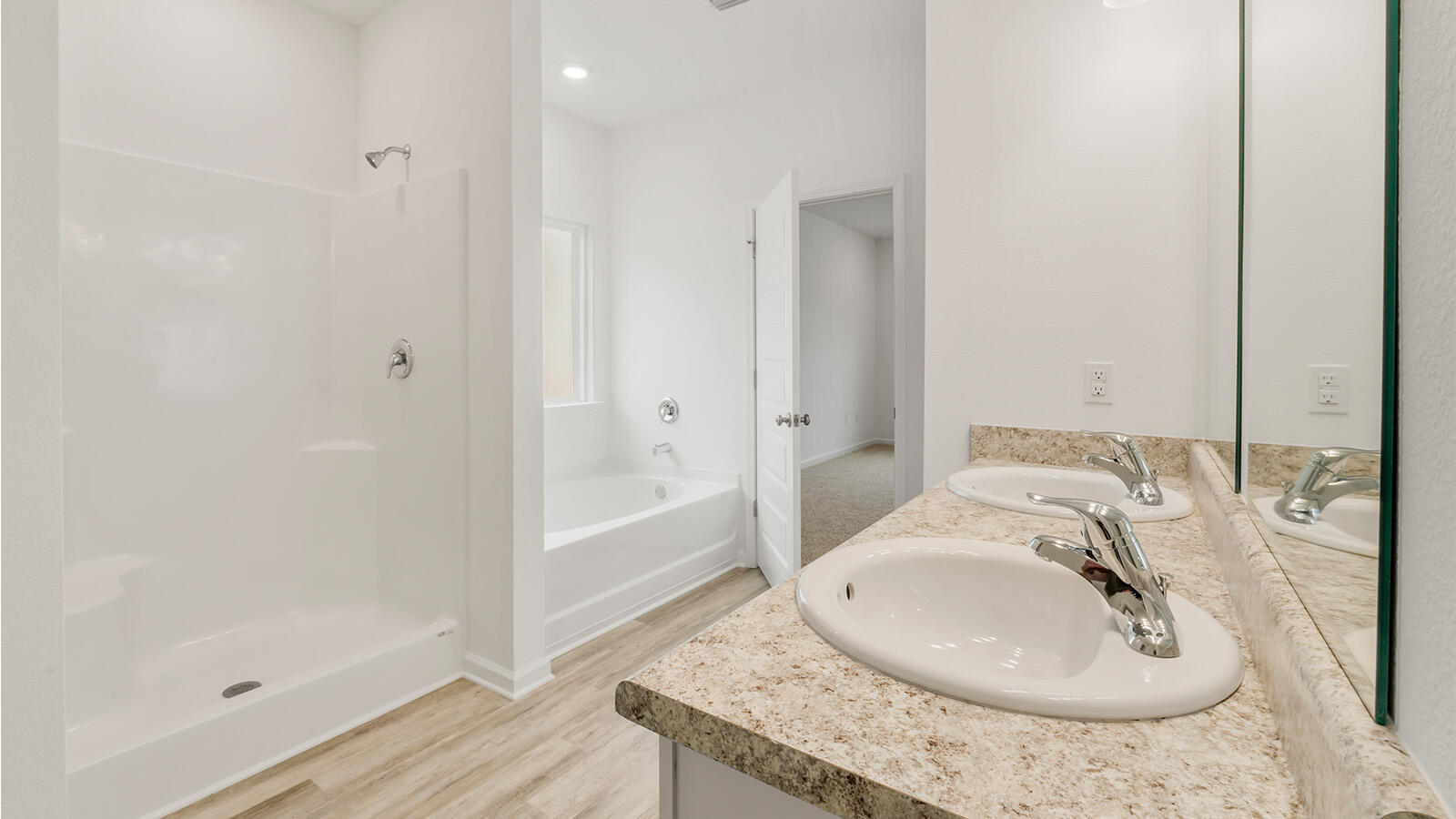 38 Elderberry Street Freeport, FL 32439 - Photo 22 of 34 a bathroom with a granite countertop sink and a mirror