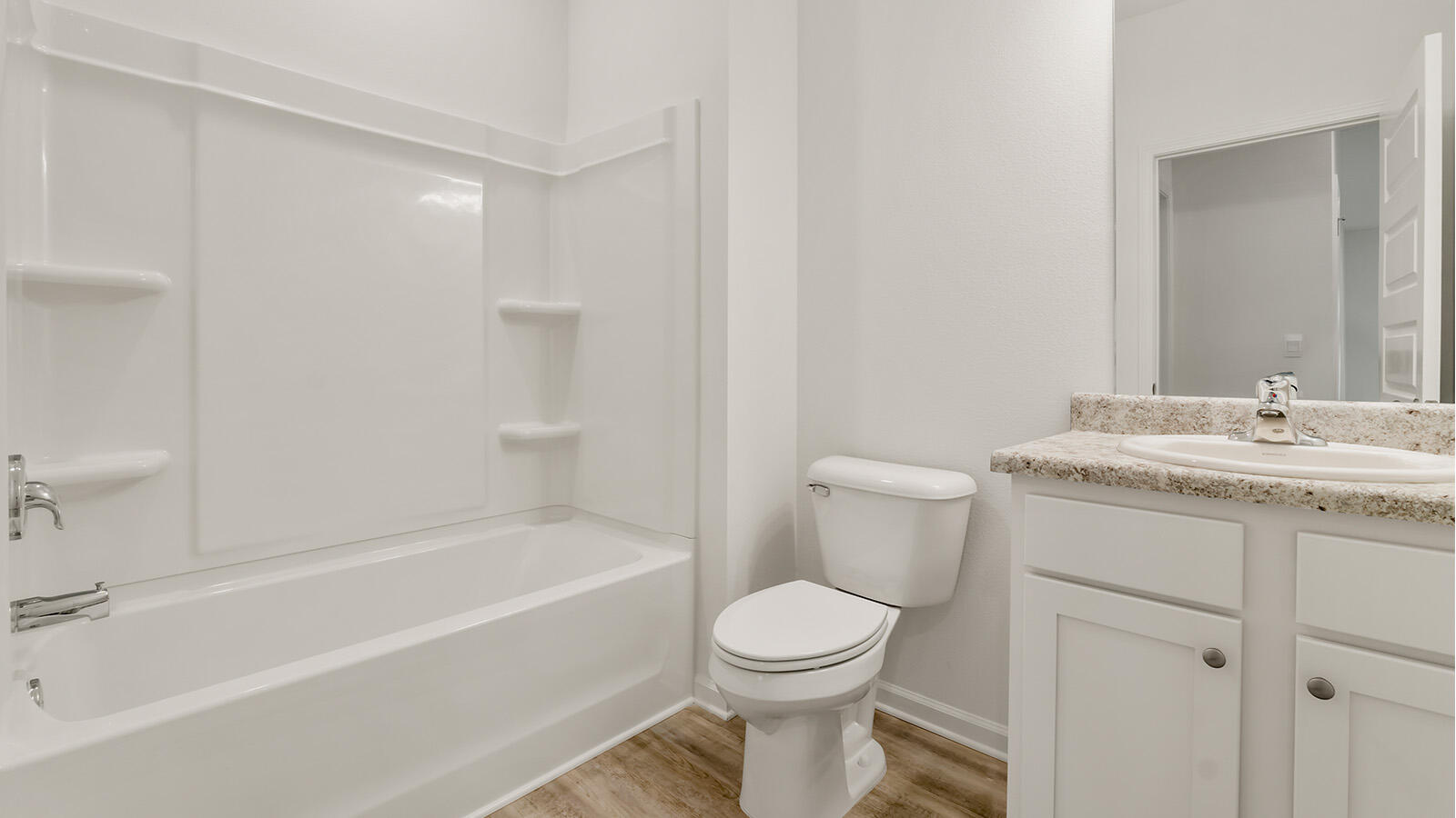 38 Elderberry Street Freeport, FL 32439 - Photo 23 of 34 a bathroom with a sink a toilet and shower