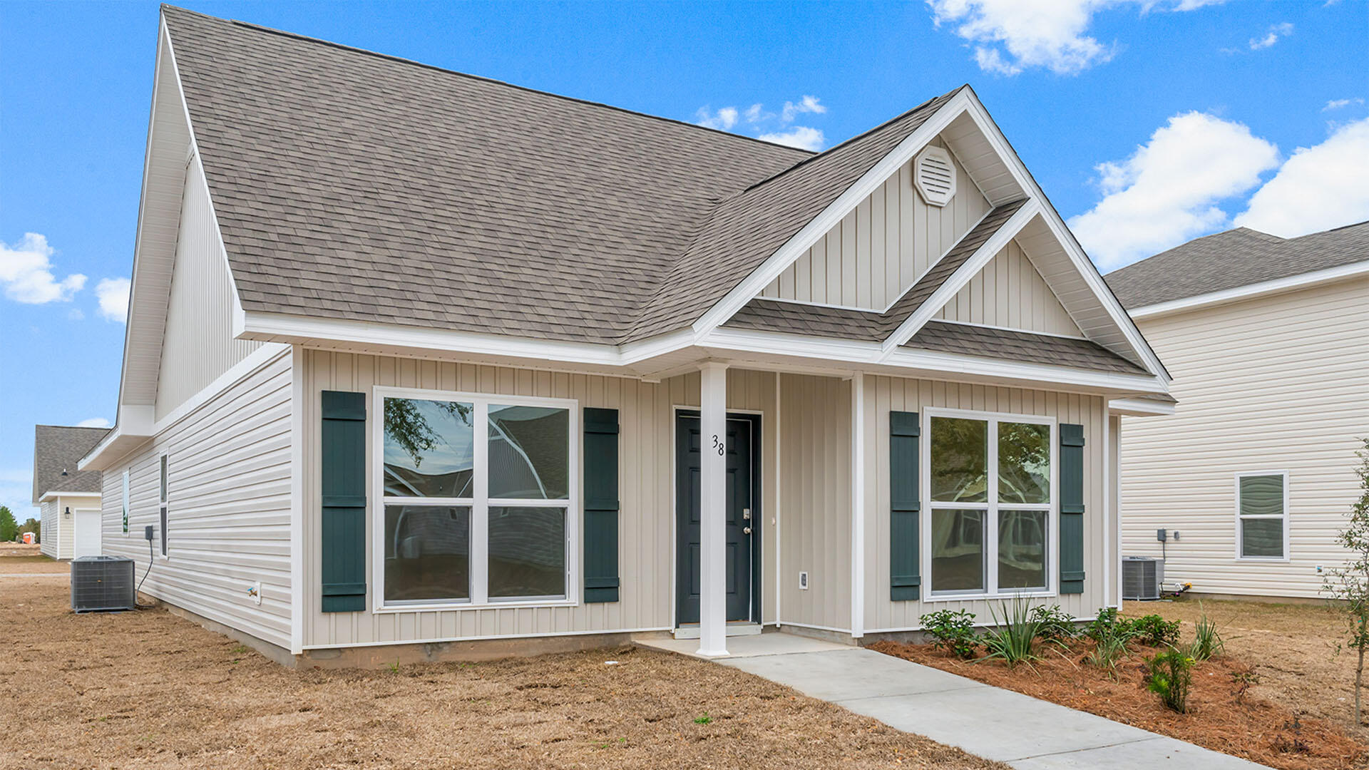 38 Elderberry Street Freeport, FL 32439 - Photo 27 of 34 a front view of a house with a yard