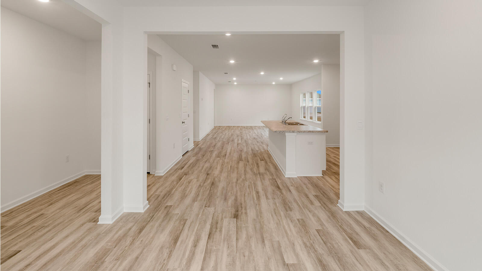 38 Elderberry Street Freeport, FL 32439 - Photo 4 of 34 a view of a living room with wooden floor