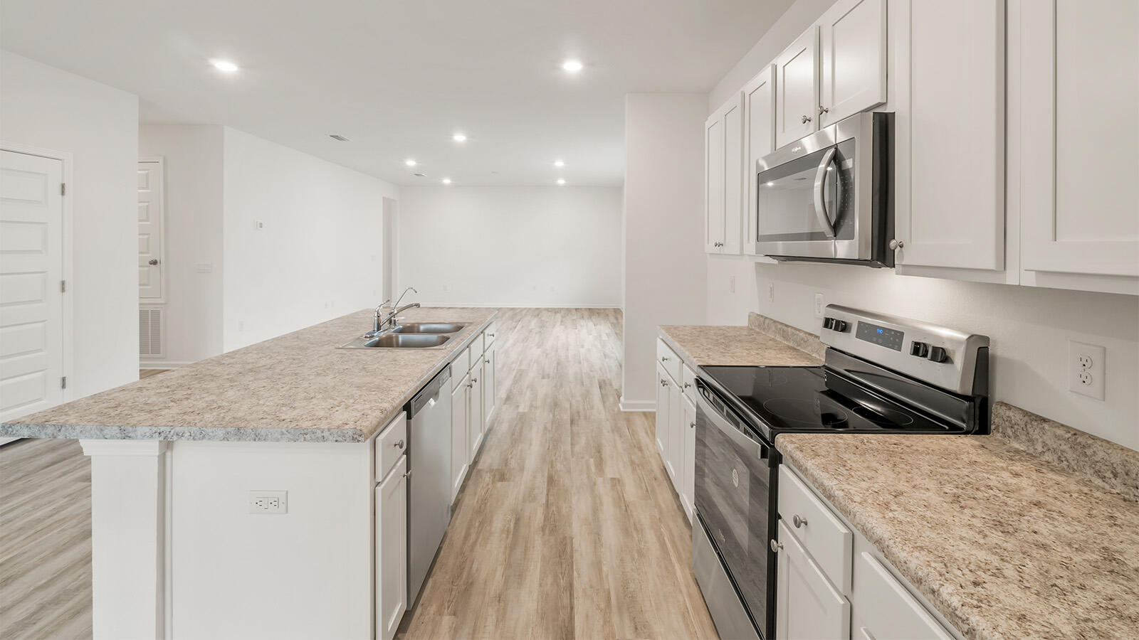 38 Elderberry Street Freeport, FL 32439 - Photo 8 of 34 a kitchen that has a sink and a stove