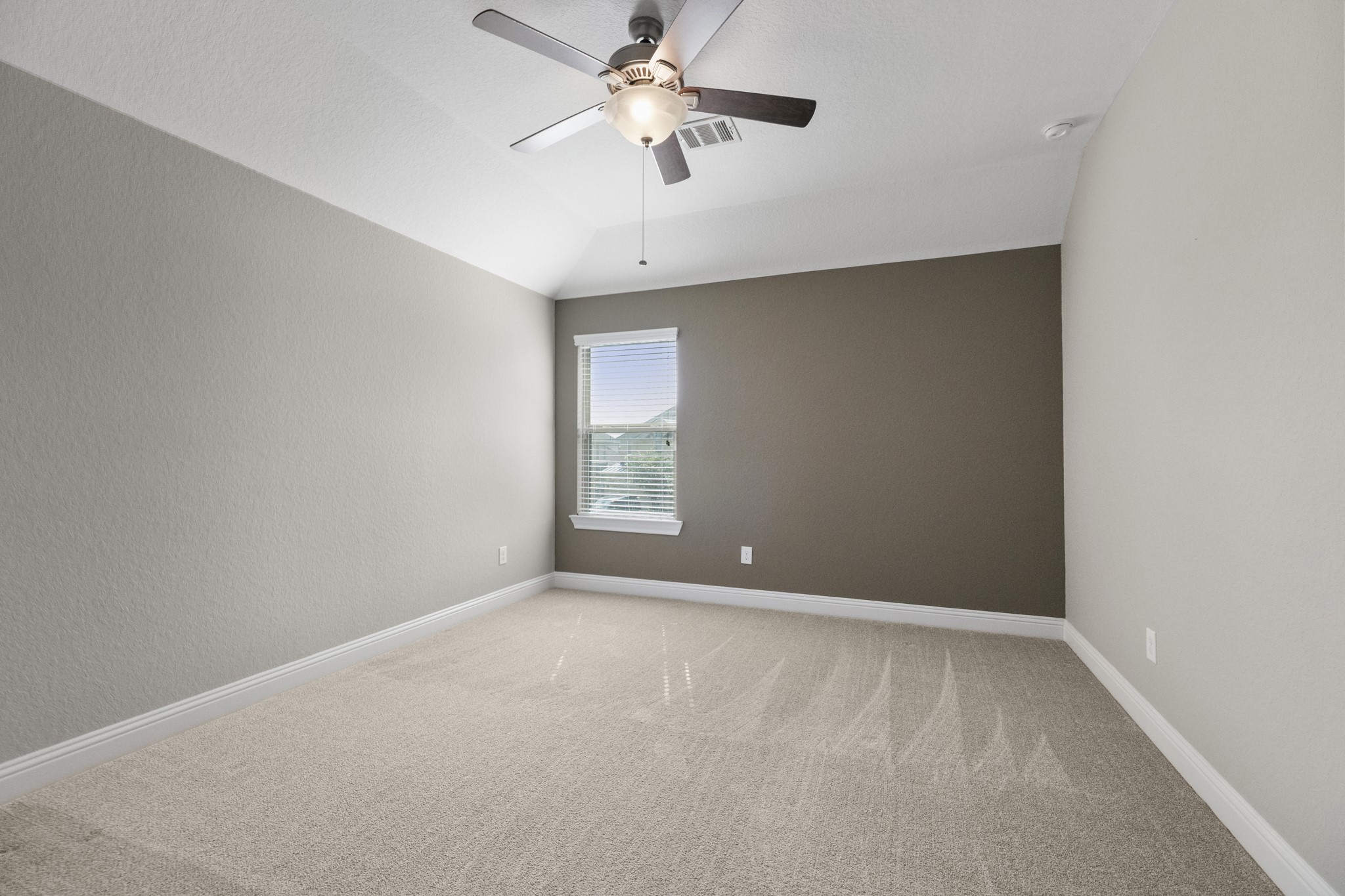 7502 Windsor Park Court Spring, TX 77379 - Photo 27 of 50 a view of an empty room with a window
