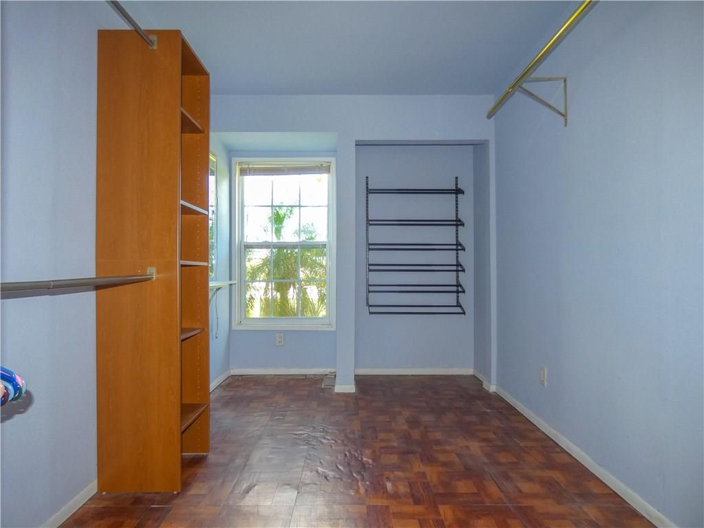 2079 Southeast Triumph Road Port St. Lucie, FL 34952 - Photo 20 of 23 an empty room with windows