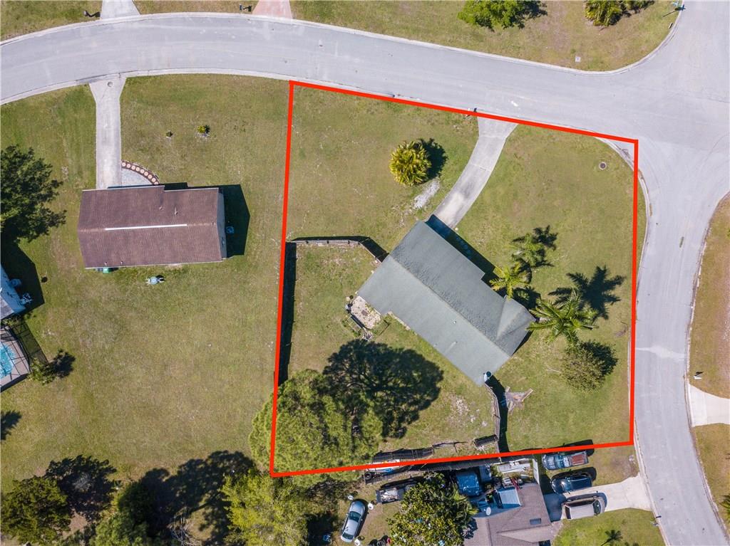 2079 Southeast Triumph Road Port St. Lucie, FL 34952 - Photo 5 of 23 an aerial view of a tennis court