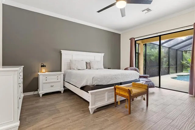 a large bathroom with a large tub and sink