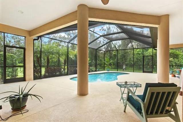 a view of a hallway with wooden shelves
