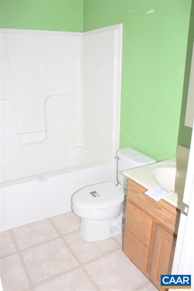 322 Chapel Road Ruckersville, VA 22968 - Photo 11 of 15 a bathroom with a toilet a sink and a bathtub