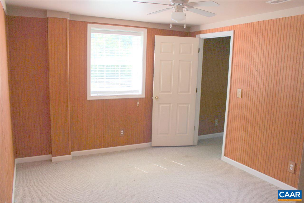 322 Chapel Road Ruckersville, VA 22968 - Photo 12 of 15 an empty room with windows and closet area