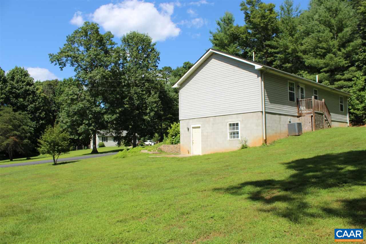 322 Chapel Road Ruckersville, VA 22968 - Photo 14 of 15 a view of a house with a yard
