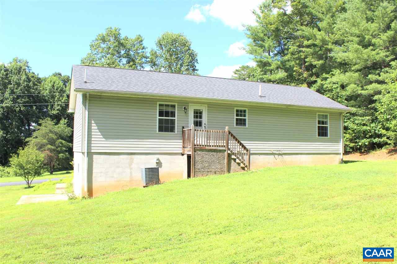 322 Chapel Road Ruckersville, VA 22968 - Photo 15 of 15 a view of a house with pool and chairs