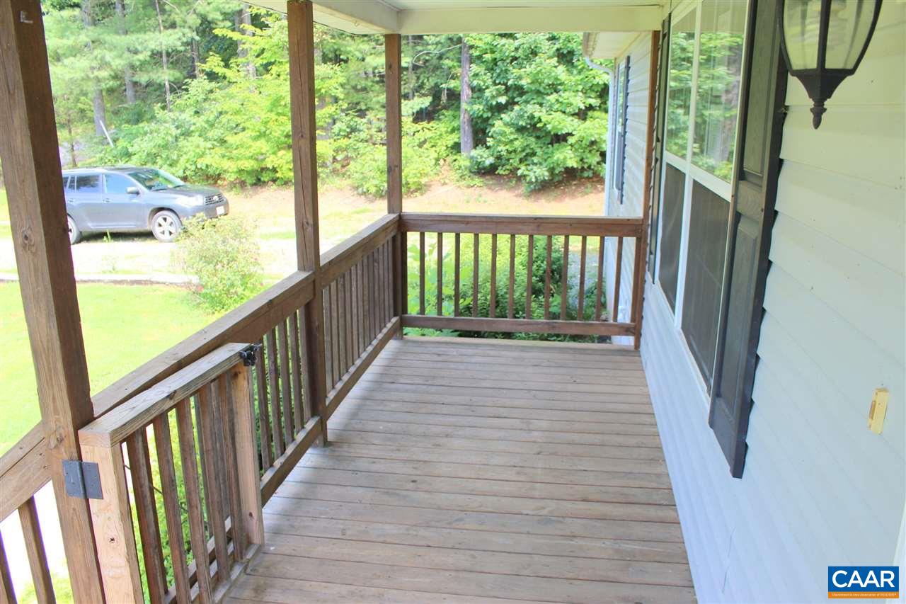 322 Chapel Road Ruckersville, VA 22968 - Photo 2 of 15 a view of a porch with wooden floor and stairs