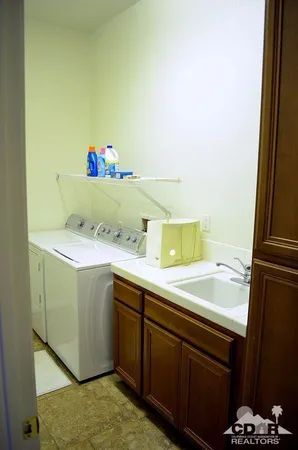 a terrace with outdoor seating and city view