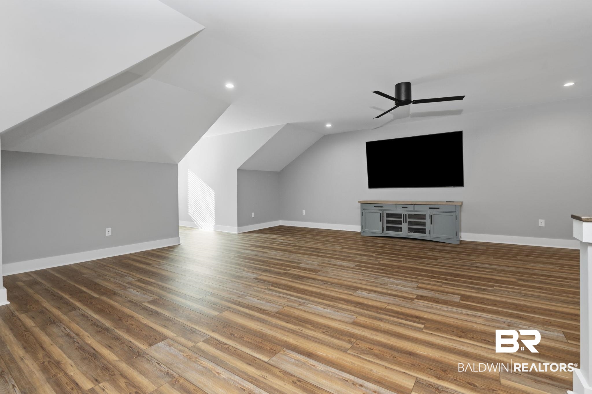 9501 Ben Hamilton Road Theodore, AL 36582 - Photo 47 of 69 Bonus room featuring light wood-style floors, lofted ceiling, ceiling fan, and recessed lighting