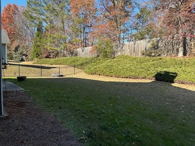 a view of a yard with an outdoor space