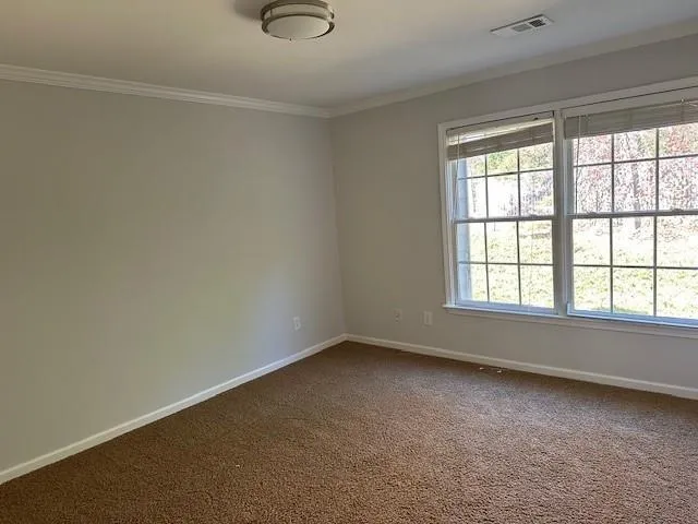 a bathroom with a tub and a shower