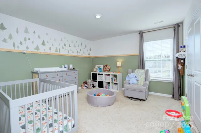 a bedroom with furniture and a bed