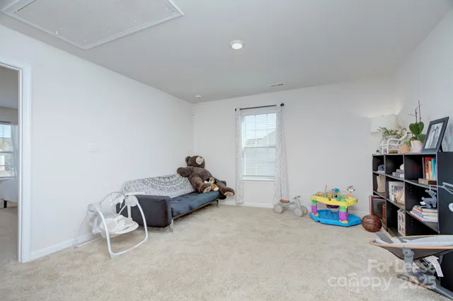 a room with toys and a wooden floor