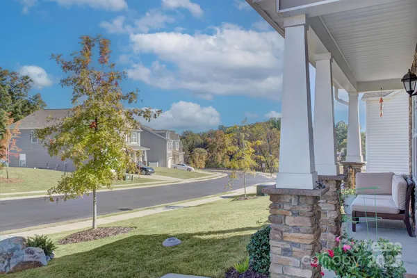 a view of a back yard of the house