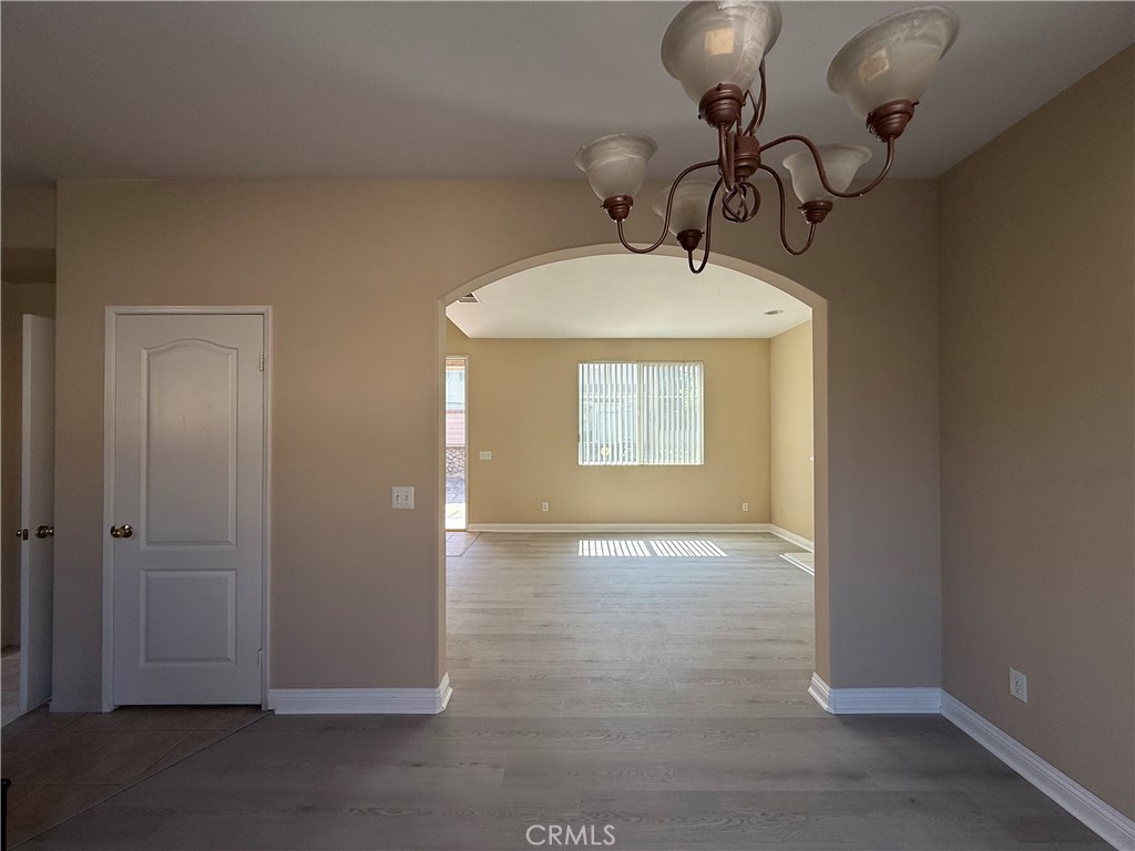 4318-4318 Walnut Street, Unit A Baldwin Park, CA 91706 - Photo 6 of 16 a view of a livingroom with a chandelier