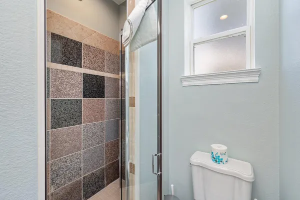 a bathroom with a sink a vanity and a mirror
