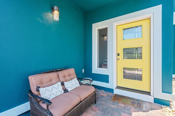 a living room with furniture and a table