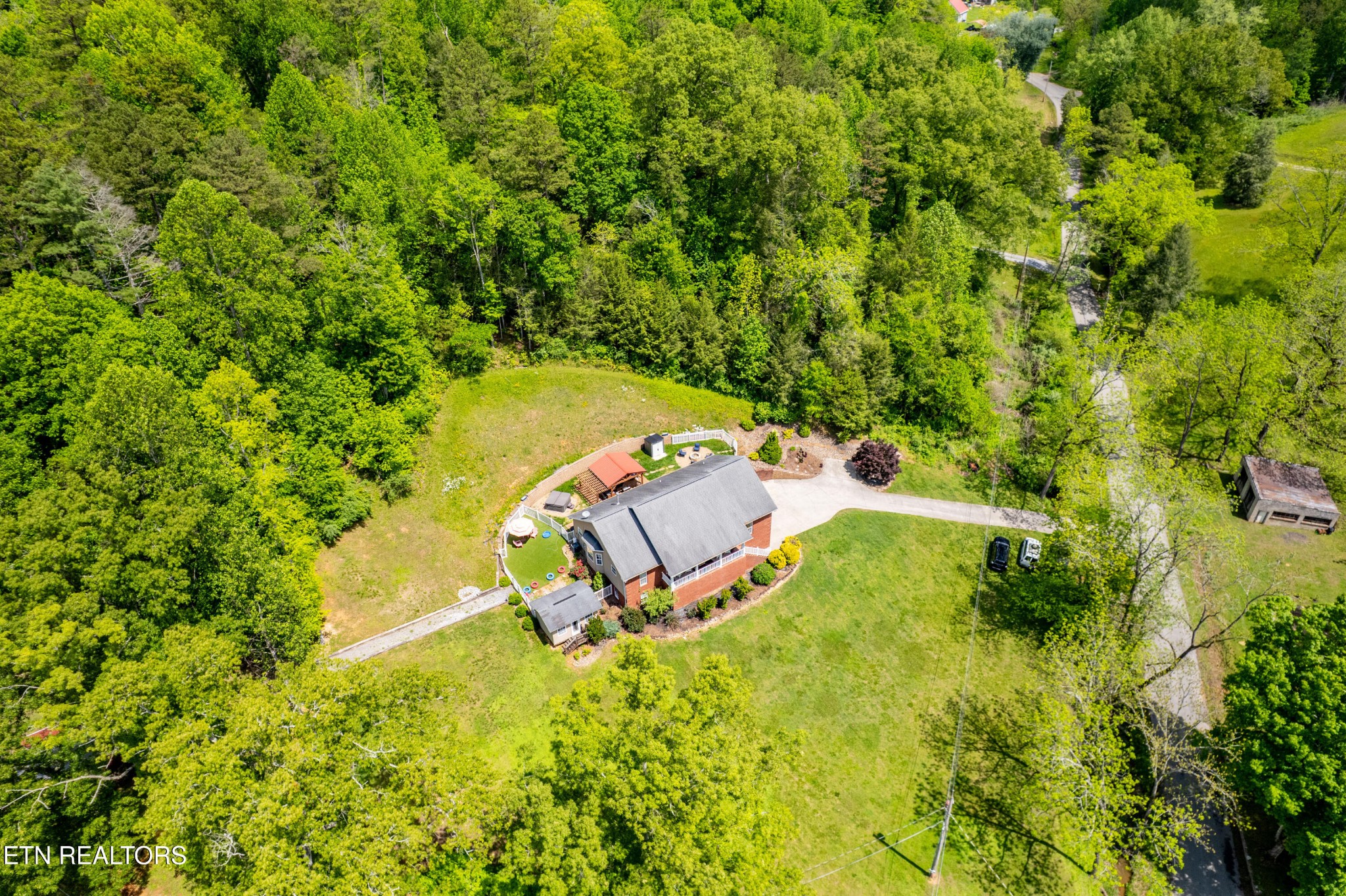 349 Rudd Hollow Road Townsend, TN 37882 - Photo 1 of 52 an aerial view of a house with a yard