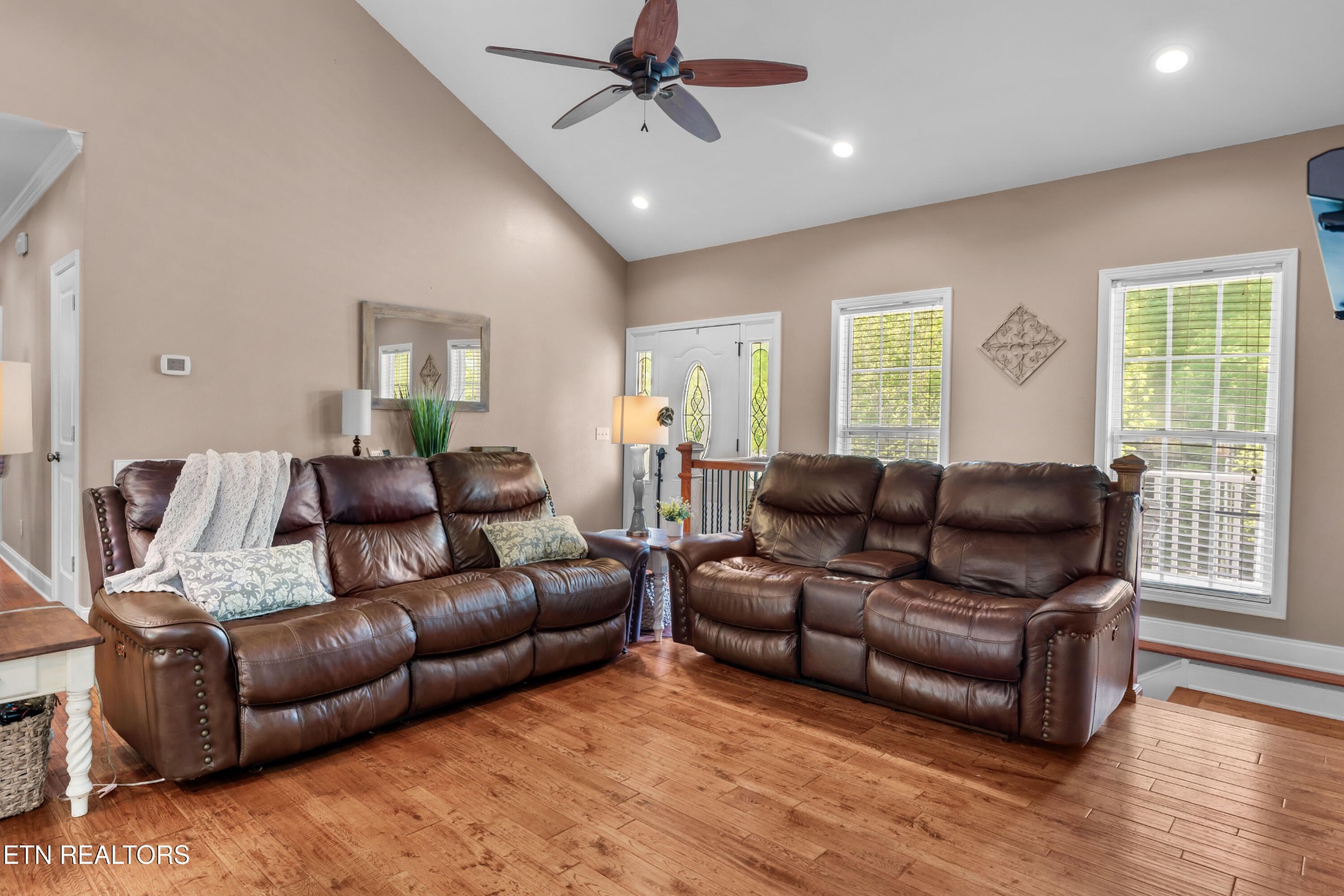 349 Rudd Hollow Road Townsend, TN 37882 - Photo 11 of 52 a living room with furniture ceiling fan and a window