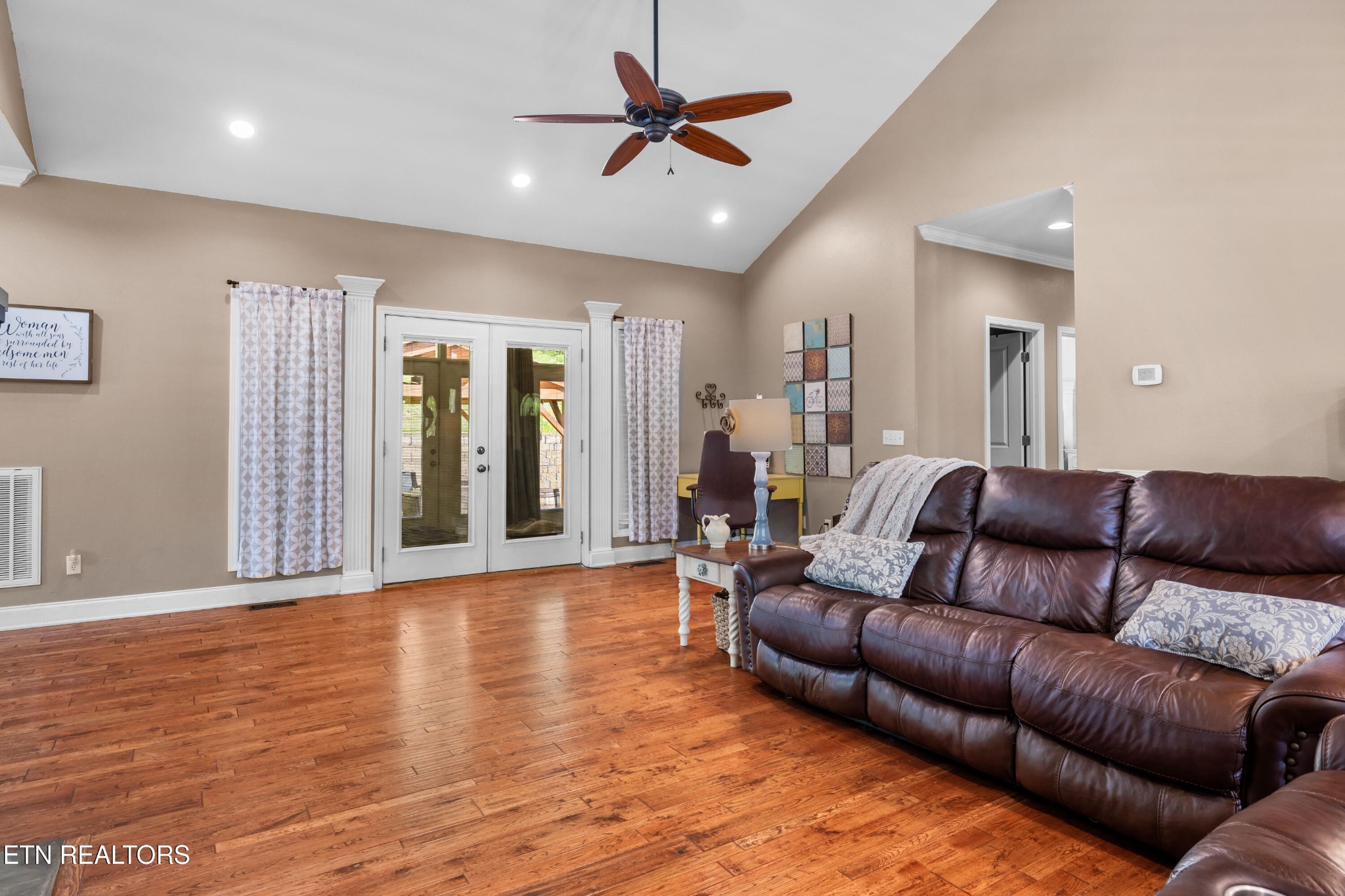 349 Rudd Hollow Road Townsend, TN 37882 - Photo 12 of 52 a living room with furniture and a ceiling fan