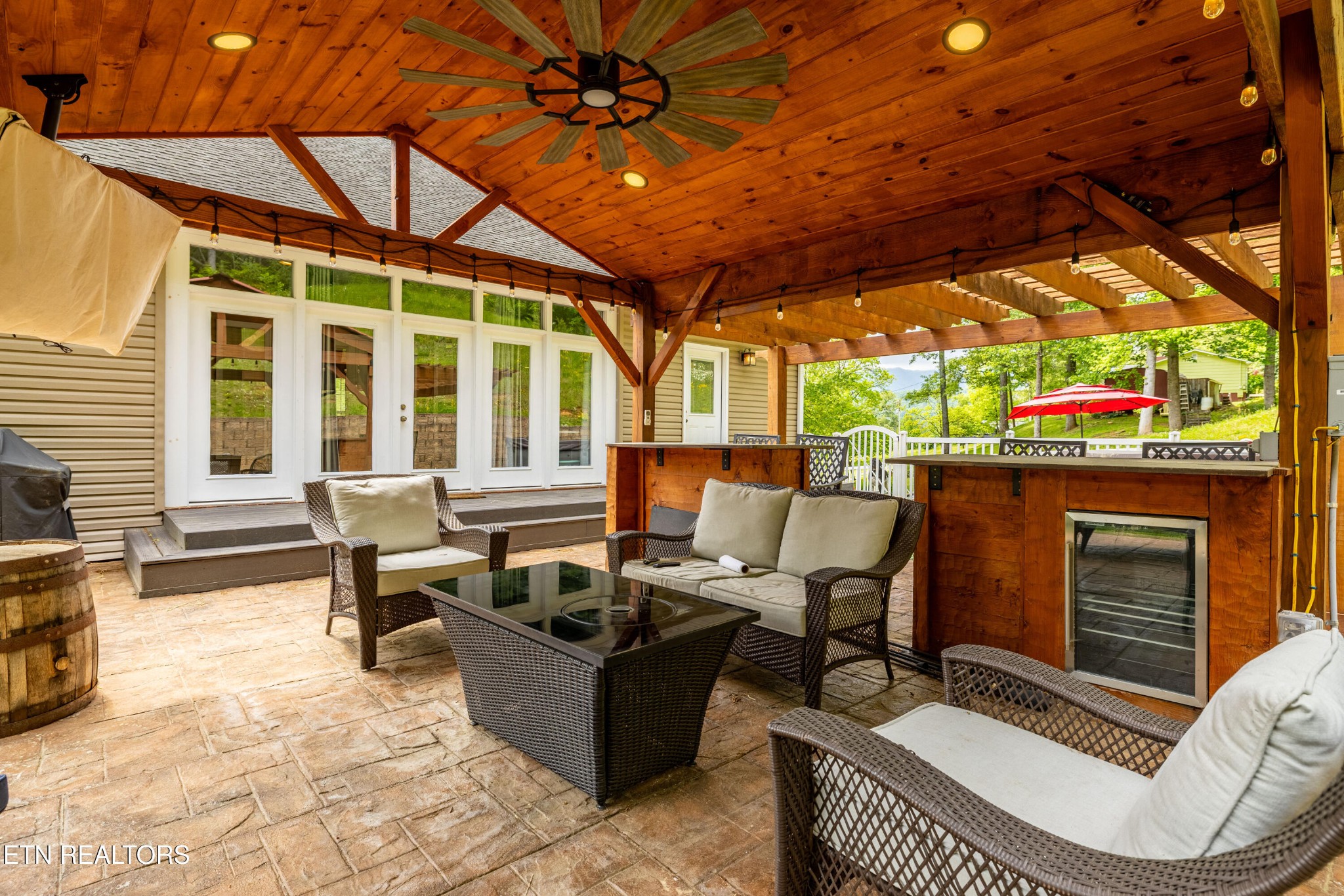 349 Rudd Hollow Road Townsend, TN 37882 - Photo 26 of 52 a building outdoor space with patio furniture and potted plants