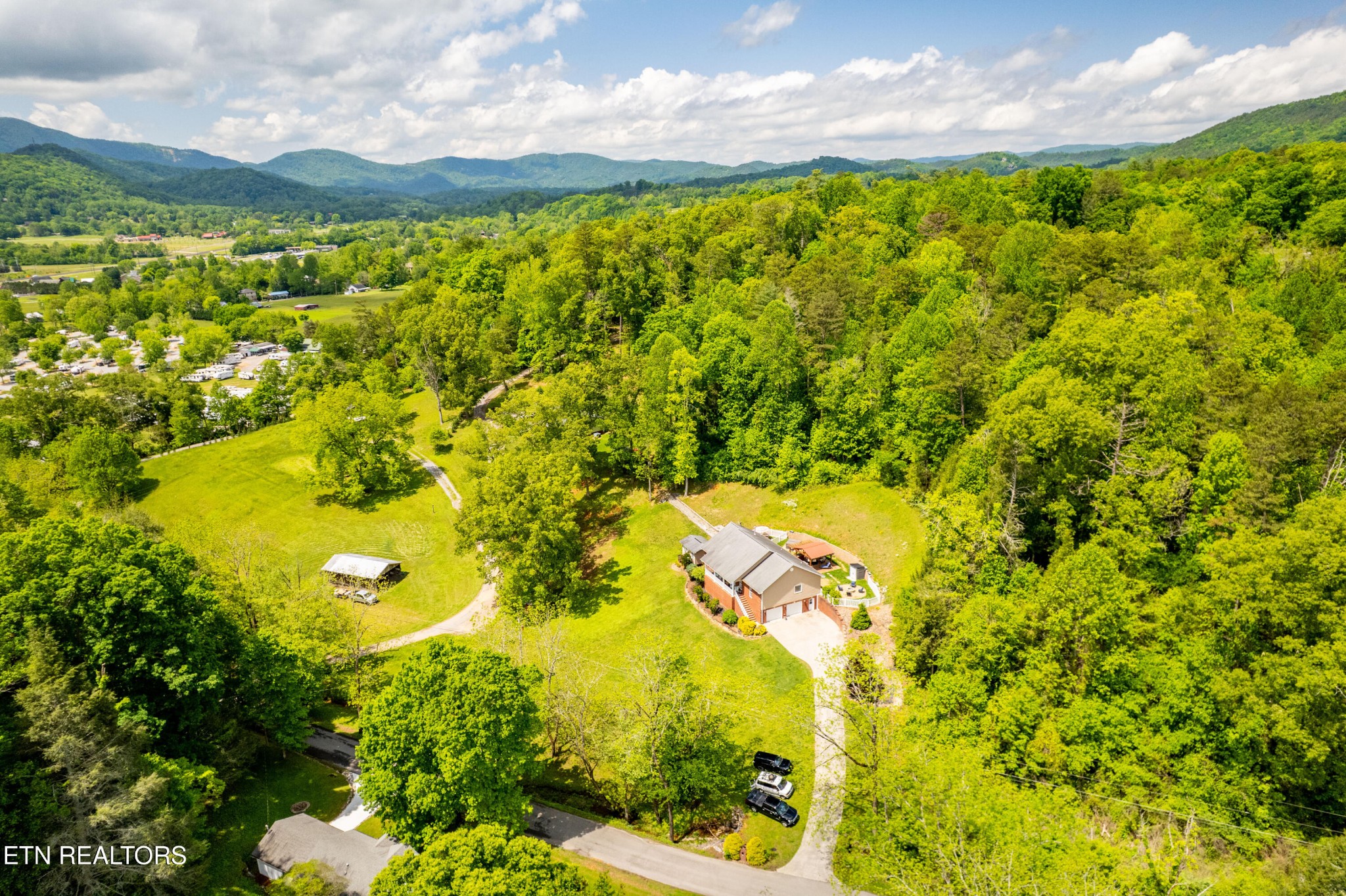 349 Rudd Hollow Road Townsend, TN 37882 - Photo 3 of 52 a view of a big yard with lots of green space