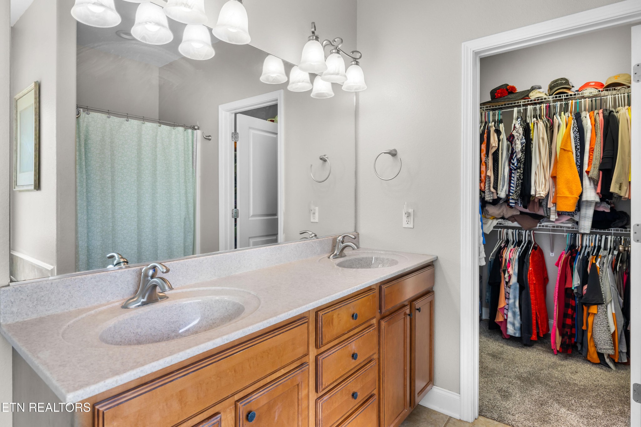 349 Rudd Hollow Road Townsend, TN 37882 - Photo 33 of 52 a bathroom with a sink double vanity and a mirror