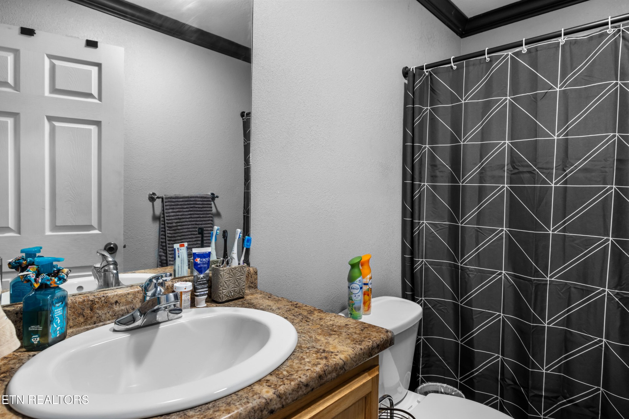 349 Rudd Hollow Road Townsend, TN 37882 - Photo 39 of 52 a bathroom with a sink and a mirror