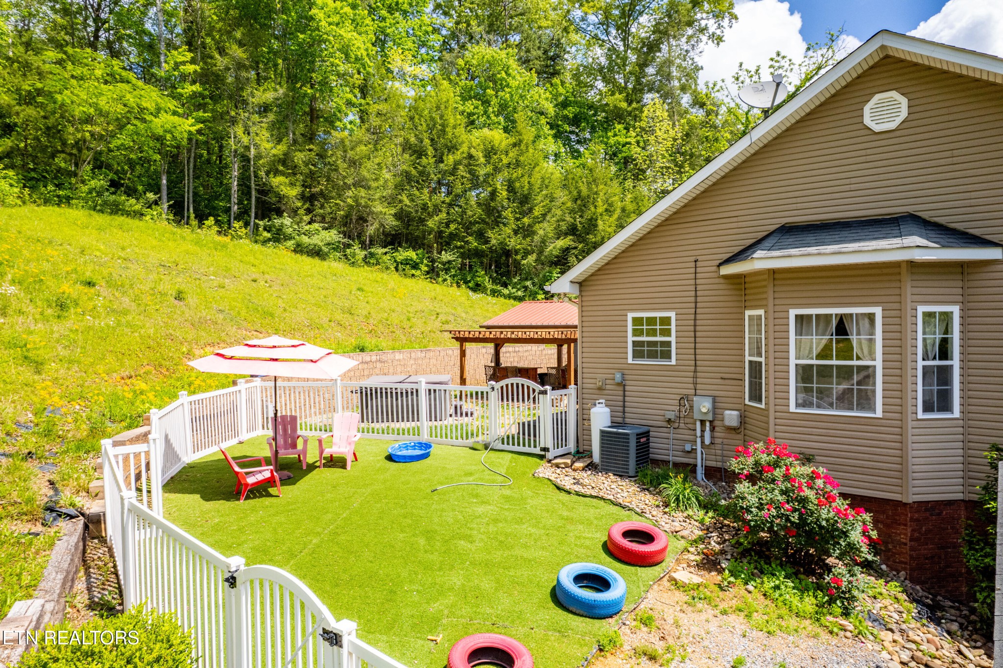 349 Rudd Hollow Road Townsend, TN 37882 - Photo 44 of 52 a view of a house with a backyard