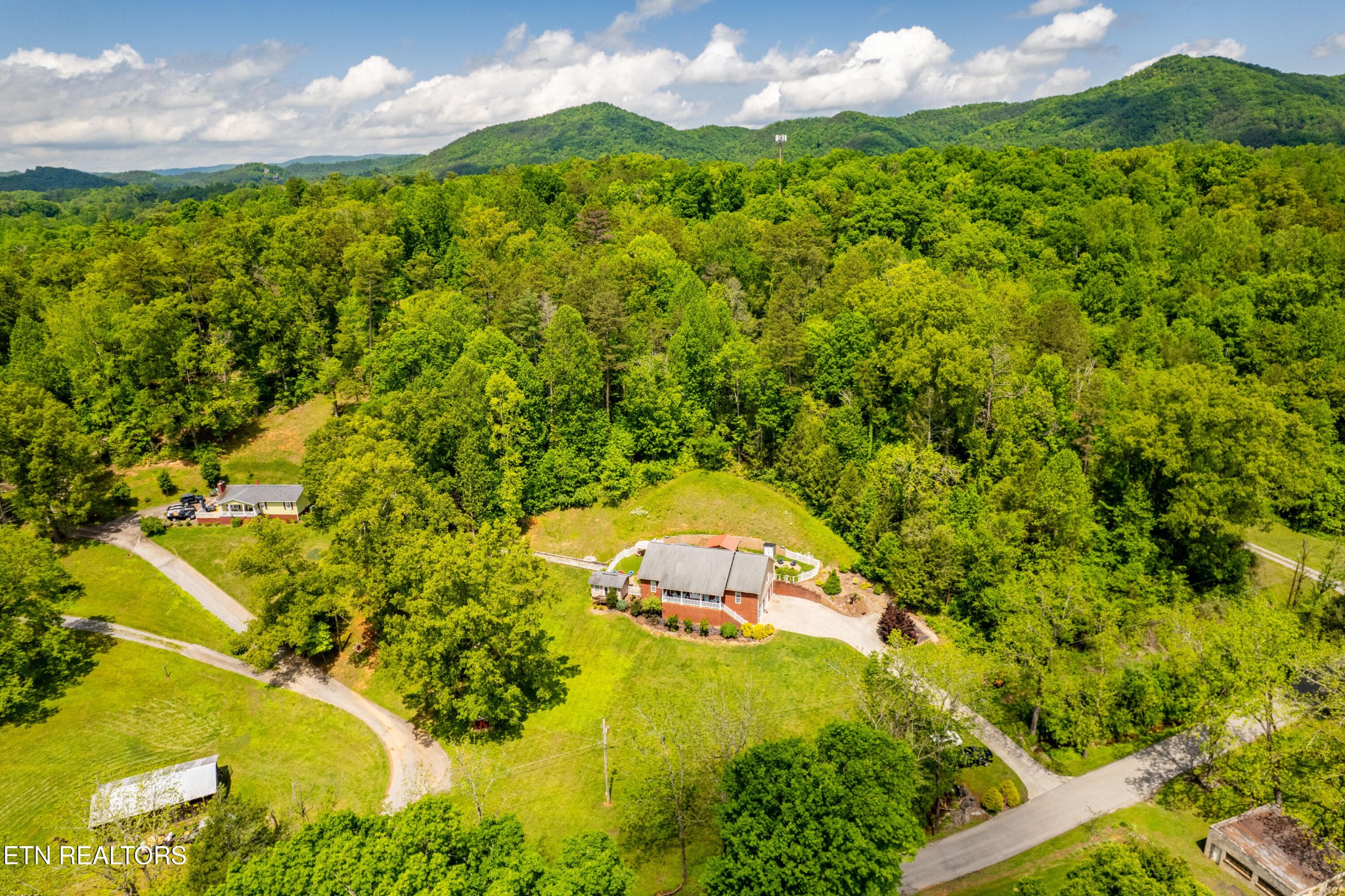 349 Rudd Hollow Road Townsend, TN 37882 - Photo 49 of 52 a view of a lake with a yard