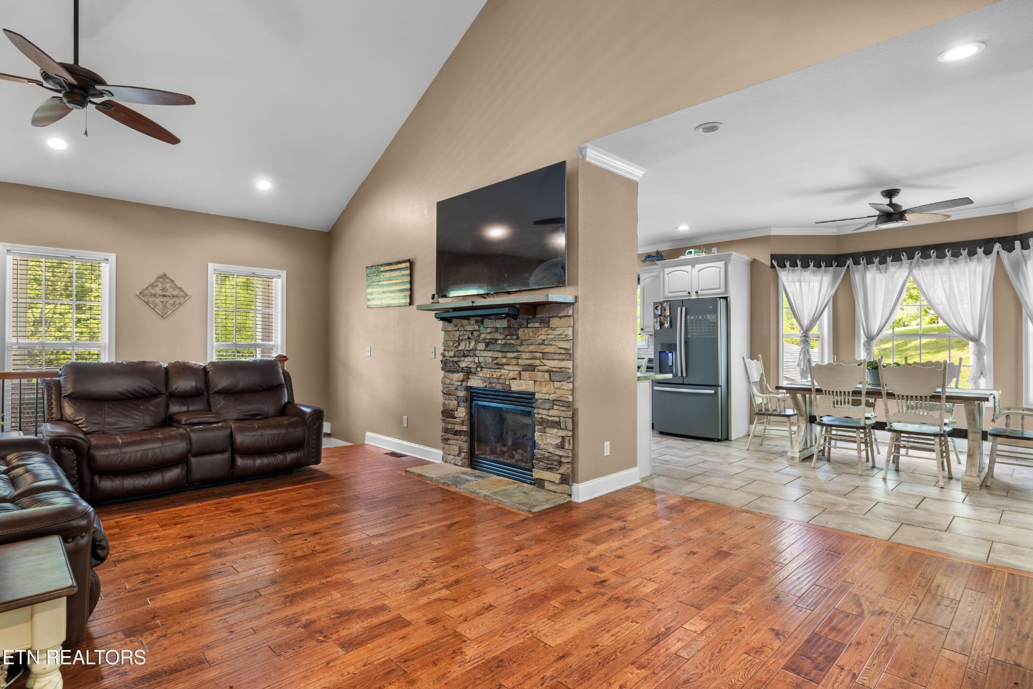 349 Rudd Hollow Road Townsend, TN 37882 - Photo 9 of 52 a living room with fireplace furniture and a flat screen tv