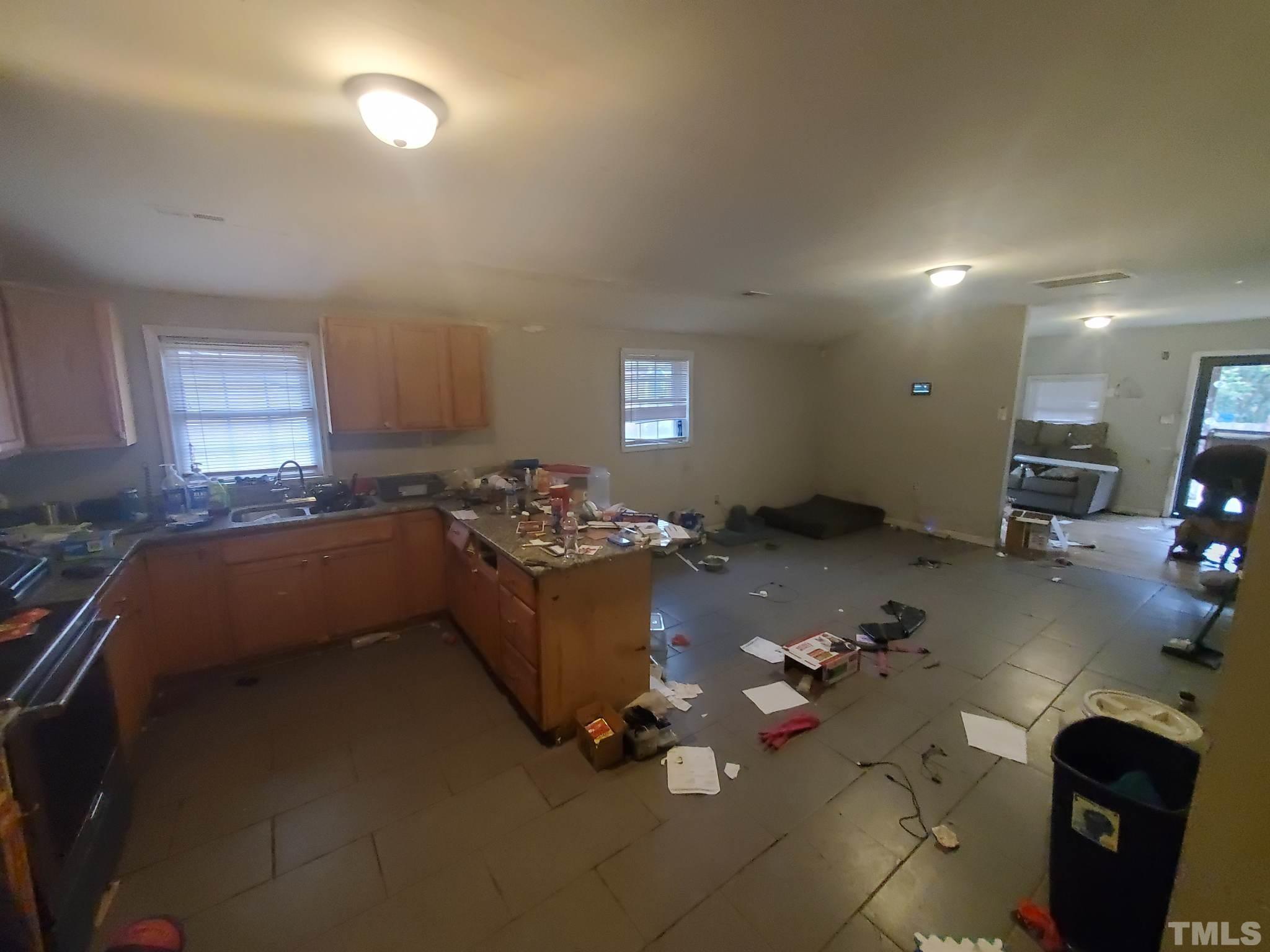 3600 Dearborn Drive Durham, NC 27704 - Photo 7 of 13 a living room with hard wood flooring and a couch