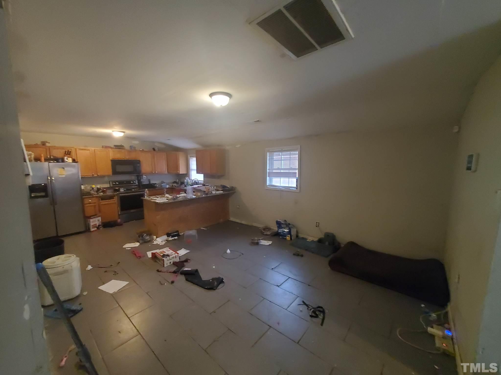 3600 Dearborn Drive Durham, NC 27704 - Photo 9 of 13 a view of a room with gym equipment
