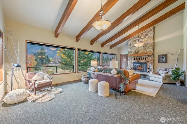 a room with furniture and a large window