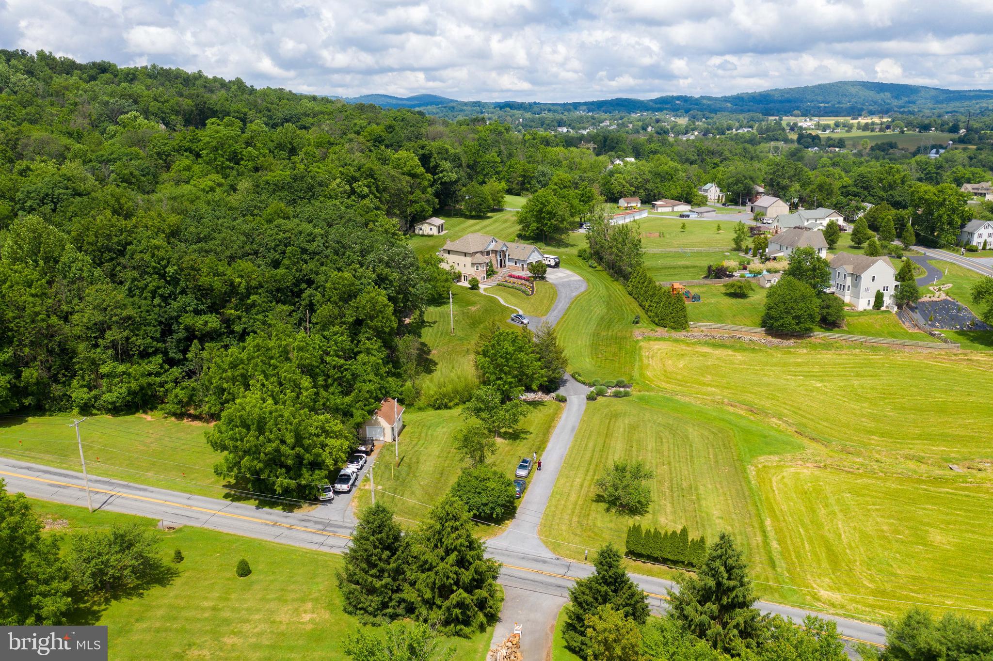 70 Horseshoe Trail Road Denver, PA 17517 - Photo 104 of 128 an aerial view of residential houses with outdoor space and trees all around