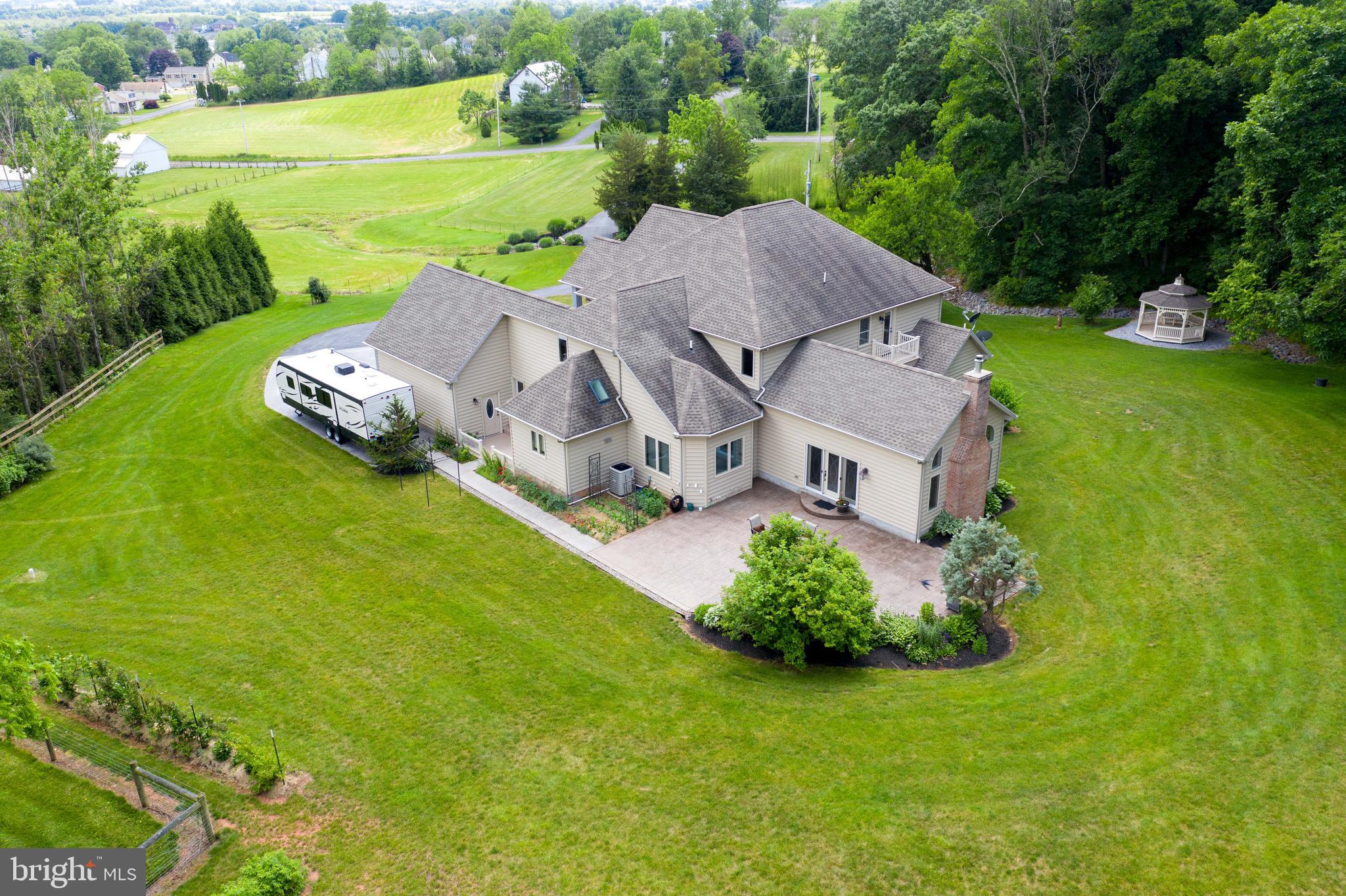 70 Horseshoe Trail Road Denver, PA 17517 - Photo 114 of 128 an aerial view of a house with a garden