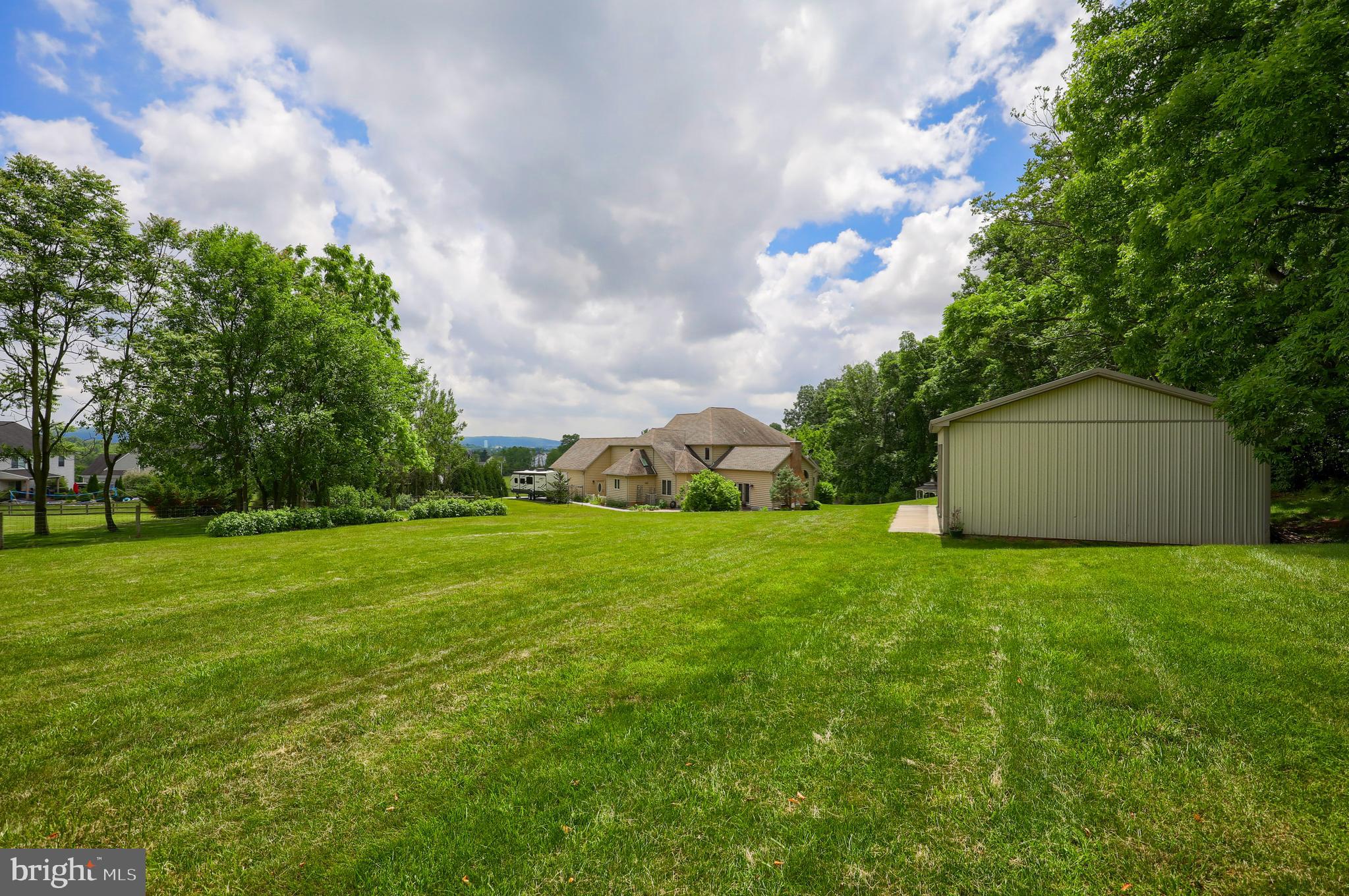 70 Horseshoe Trail Road Denver, PA 17517 - Photo 125 of 128 a view of a field of grass and trees